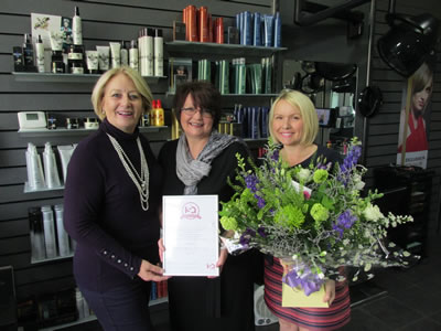 Donna receiving the award